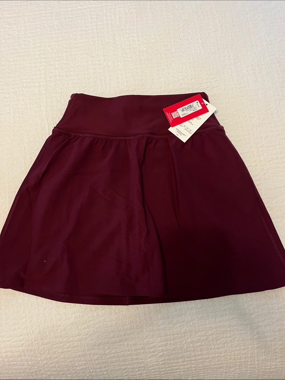 SPANX Get Moving skort plumberry size Small